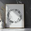 Intricate Flower Wreath Vector Art A floral wreath design with intricate details and shapes.