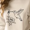 Beautiful Bird on Floral Background A colorful hummingbird perched on a blooming flower, ideal for floral-themed crafts.