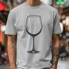 A wine glass filled with red wine on a table or countertop.
