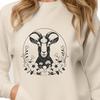 Goat Silhouette in a Floral Setting Illustration of a farm animal, a goat in a natural setting.