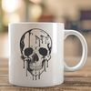 Free Vector Skull Design with Droplets A graphic illustration of a skull with dripping effects, suitable for use in various design projects.