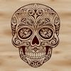 A gothic witchcraft illustration featuring an ornate skull.