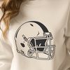 An illustrated American football featuring a football helmet and laces.