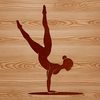 Beautiful Gymnast Leaping Over Balance Beam A young female gymnast in mid-motion, leaping over a balance beam.