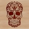 A detailed, ornate skull design with intricate details suitable for tattoo art or stencil use.