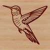 A colorful hummingbird in mid-flight, its wings beating rapidly.