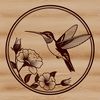 Whimsical Hummingbird Floral Design An SVG vector design featuring a realistic hummingbird bird surrounded by flowers.