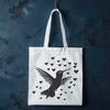 Lovely Hummingbird Silhouette with Heart Accents A full-body illustration of a hummingbird in mid-flight, with love hearts surrounding its body.
