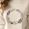 Free Vector Art Clip Art Wreath A floral wreath design made up of intricate shapes and patterns, suitable for digital cutting machines like Cricut.
