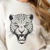 Sharp Teeth and Piercing Eyes SVG A close-up illustration of a jaguar's head with sharp teeth and piercing eyes.