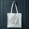Leaf Clip Art for Crafting A stylized vector illustration of a single leaf with intricate details.