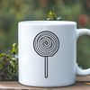 A colorful illustration of a lollipop with a swirly stick and a round treat on top.