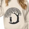 Symbolic Love Tree Silhouette A tree with two intertwined branches forming a heart shape, symbolizing love and unity.