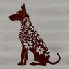 Large Dog Silhouette with Floral Accent A large breed dog sitting in front of a floral pattern.