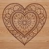 A colorful, intricate mandala design in the shape of a heart.