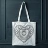 Beautiful Vector Art Heart Pattern A stylized vector mandala heart design featuring intricate patterns and shapes, suitable for various digital applications.