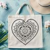 Beautiful Vector Heart Mandala Design A intricate heart-shaped mandala design created using vector art.