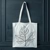 Stylized Vector Greenery A stylized vector graphic of a single leaf with simple lines and shapes.