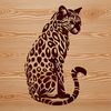 Wild Cat Silhouette in Vector Format A sleek and agile big cat from the wild with distinctive markings, in vector format.
