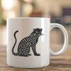 Wild Ocelot SVG Vector Graphic A large wild cat with distinctive markings sits on the ground, depicted as a vector graphic.