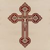 An illustration of a crucified figure set against a decorative background.