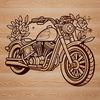 Ornate motorcycle design with floral patterns, suitable for vector art projects.