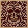 A detailed illustration of a skull with intricate ornaments.