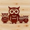 Cute Owl Silhouette A cartoon owl perched on a tree branch, made up of simple shapes and lines, perfect for use in design projects.