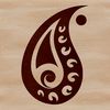 Beautiful Decorative Paisley Element A intricately designed ornate paisley shape used as a decorative embellishment.