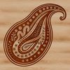 A stylized, ornate paisley shape used as a design element in various crafts and digital projects.