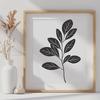 A simple vector illustration of a single green leaf with veins.