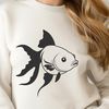 Swimming Pet Silhouette A colorful goldfish swimming in water, commonly kept as a domestic pet.