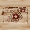 Digital Camera Icon in Simple Vector Shapes A digital camera icon made from clean vector lines and simple shapes, suitable for design projects.