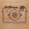 Camera Icon in Detail A digital camera illustration with detailed components.