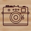 Simple Digital Camera Design A simple line drawing of a digital camera with lens and body.