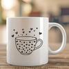 Heartwarming Cup Design with Whimsical Motifs A simple cup design with heart-shaped motifs.