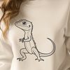 Small reptile illustration with colorful scaly skin A colorful illustration of a small reptile with scaly skin and a long tail, perfect for use in various design projects.