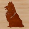 A portrait of a Shetland sheepdog sitting on its haunches.