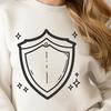 Metallic Coat of Arms Emblem with Geometric Pattern A stylized metal shield with a geometric pattern.