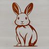 A cartoon-style illustration of a sitting rabbit in vector format.