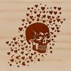 A stylized skull design featuring love hearts, suitable for crafting and design projects.