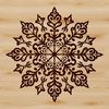 A delicate winter snowflake design made up of intricate lines and shapes.