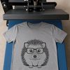 Cute Cartoon Hedgehog with Glasses A cartoon hedgehog character wearing glasses in a vector design style.