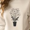 Springtime Blooming Flower Icon A single white daffodil flower growing in a small pot with green foliage.