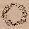 An SVG illustration of a decorative wreath featuring a mix of flowers and foliage.