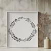 Interlocking Leaf Wreath Design A floral wreath design made from interlocking leaves and flowers.