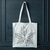 A stylized graphic representation of a lone leaf with intricate details.