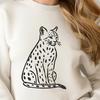 A close-up illustration of a sitting ocelot in a natural setting, featuring the wild animal's distinctive markings.
