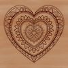 A decorative mandala design featuring a heart shape, suitable for vector art and cutting machine projects.