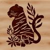 Large Tiger in Floral Setting A large tiger sitting in a grassy area with foliage surrounding it.